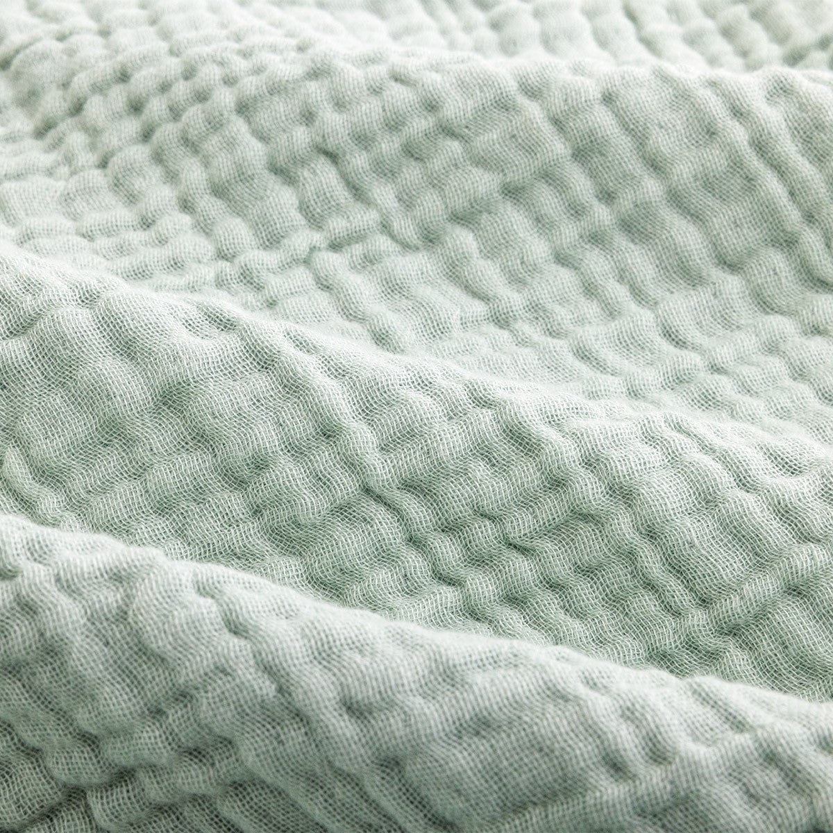 Mušelínový přehoz s třásněmi světle modrý